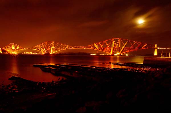 Forth Rail Bridge under moonlight.